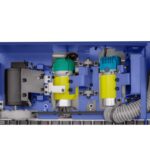 Plaqueuse de chants Cormak EBM120 230v avec Aspirateur. Interieur